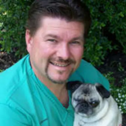 Dr. Michael Slawienski WITH A DOG